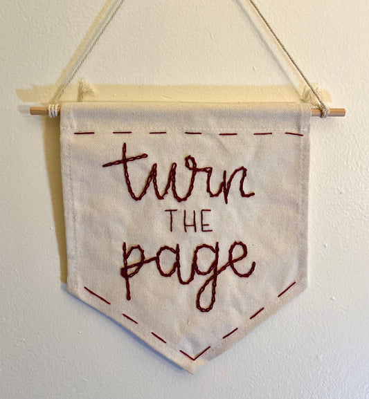 Turn the Page Banner